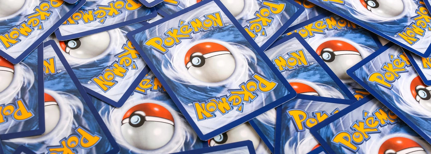 Pokémon Trading Card Game cards spread out on a table